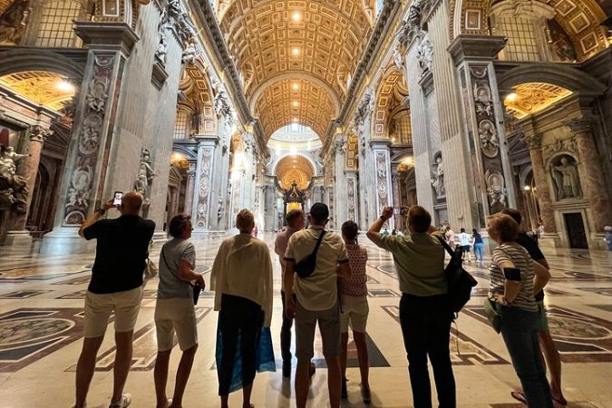 A group of travelers in the St. peter's Basilica